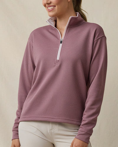 Woman wearing the Straight Down Opal Half Zip in Oxblood Red with a contrast half-zip mock neck