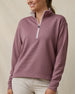 Woman wearing the Straight Down Opal Half Zip in Oxblood Red with a contrast half-zip mock neck