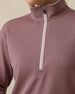 Close-up of the Opal Half Zip in Oxblood Red featuring the contrast half-zip closure