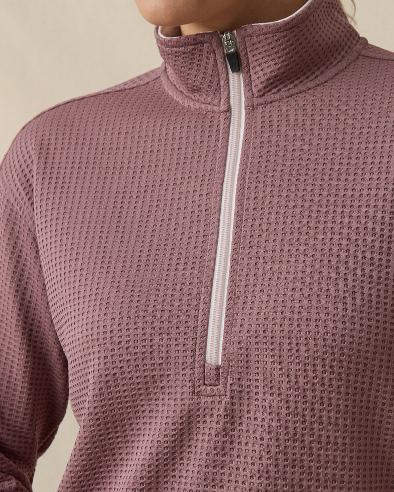Close-up of the Opal Half Zip in Oxblood Red featuring the contrast half-zip closure