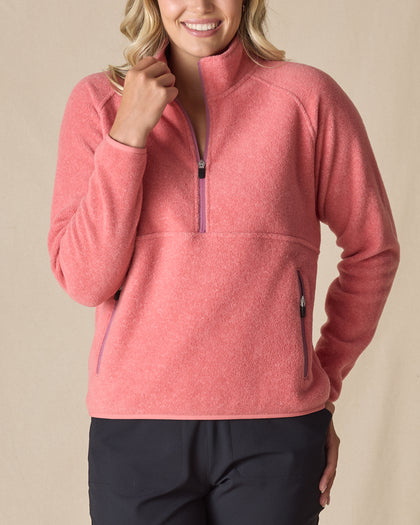 Women's Cerro Quarter Zip in Cedar, front view on model featuring a coral fleece quarter zip pullover with purple zipper accents, paired with black pants