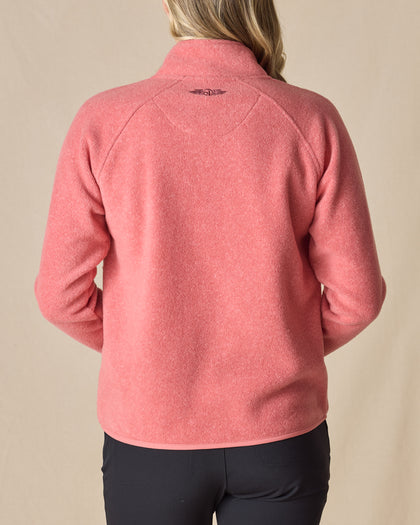 Women's Cerro Quarter Zip in Cedar, back view on model featuring the Straight Down logo embroidered at center back on a coral fleece quarter zip pullover, paired with black pants