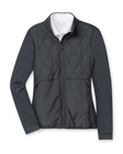 Women's Hera Jacket in Black, flat lay front view featuring a hybrid construction with a quilted diamond-pattern front body and solid stretch sleeves, full zip closure, stand-up collar, and zip side pockets, layered over a white collared shirt