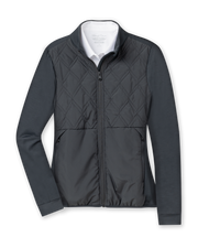 Women's Hera Jacket in Black, flat lay front view featuring a hybrid construction with a quilted diamond-pattern front body and solid stretch sleeves, full zip closure, stand-up collar, and zip side pockets, layered over a white collared shirt