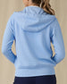 Eliza Hoodie in Carolina, back view on model showing a light blue waffle-knit full zip hoodie with drawstring hood, paired with navy pants