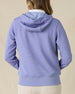 Eliza Hoodie in Blue Shade, back view on model in solid blue waffle knit texture with drawstring hood, layered over a white polo