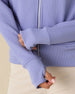 Eliza Hoodie in Blue Shade, close-up detail view on model featuring ribbed thumbhole cuffs and waffle knit texture