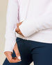 Close-up of the Eliza Hoodie in Pale Pink highlighting the waffle knit fabric and ribbed thumbhole cuff