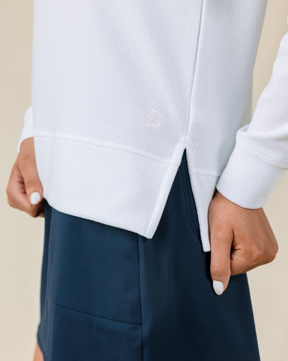 Daria Hoodie in White with textured waffle knit fabric, hem detail view