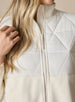 Women's Laurel Hybrid Fleece Jacket in Cream, close-up front detail view featuring the diamond quilted upper body panel and full-zip closure