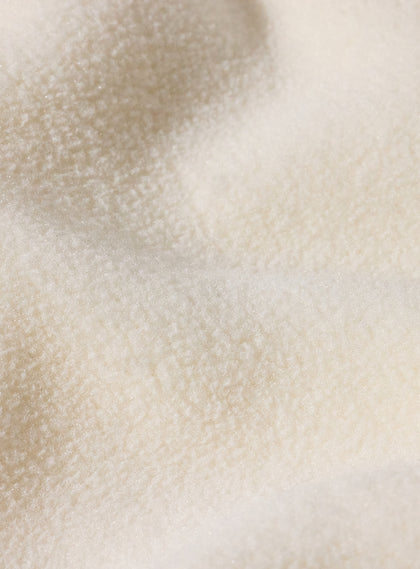 Women's Laurel Hybrid Fleece Jacket in Cream, close-up fabric detail view featuring the soft textured fleece material