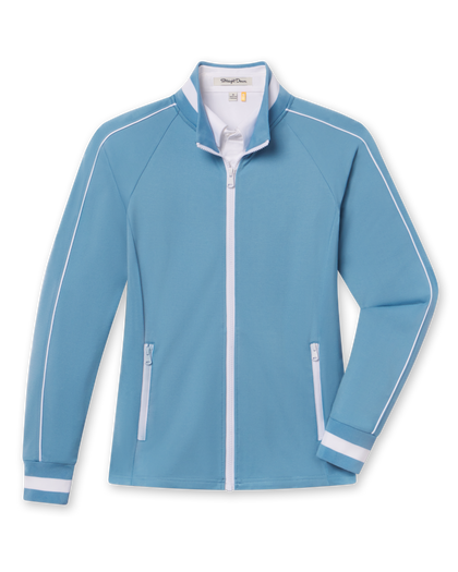 Women's Patty Jacket in Coastal, flat lay front view featuring a solid light blue fabric with white contrast piping along the sleeves, full zip closure, stand collar, dual zip pockets, and white striped cuffs