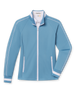 Women's Patty Jacket in Coastal, flat lay front view featuring a solid light blue fabric with white contrast piping along the sleeves, full zip closure, stand collar, dual zip pockets, and white striped cuffs