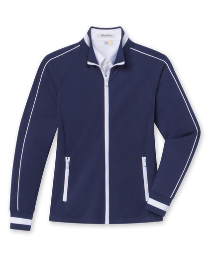 Women's Patty Jacket in New Indigo, flat lay front view featuring a solid navy fabric with white contrast piping along the sleeves, full zip closure, stand collar, dual zip pockets, and white striped cuffs