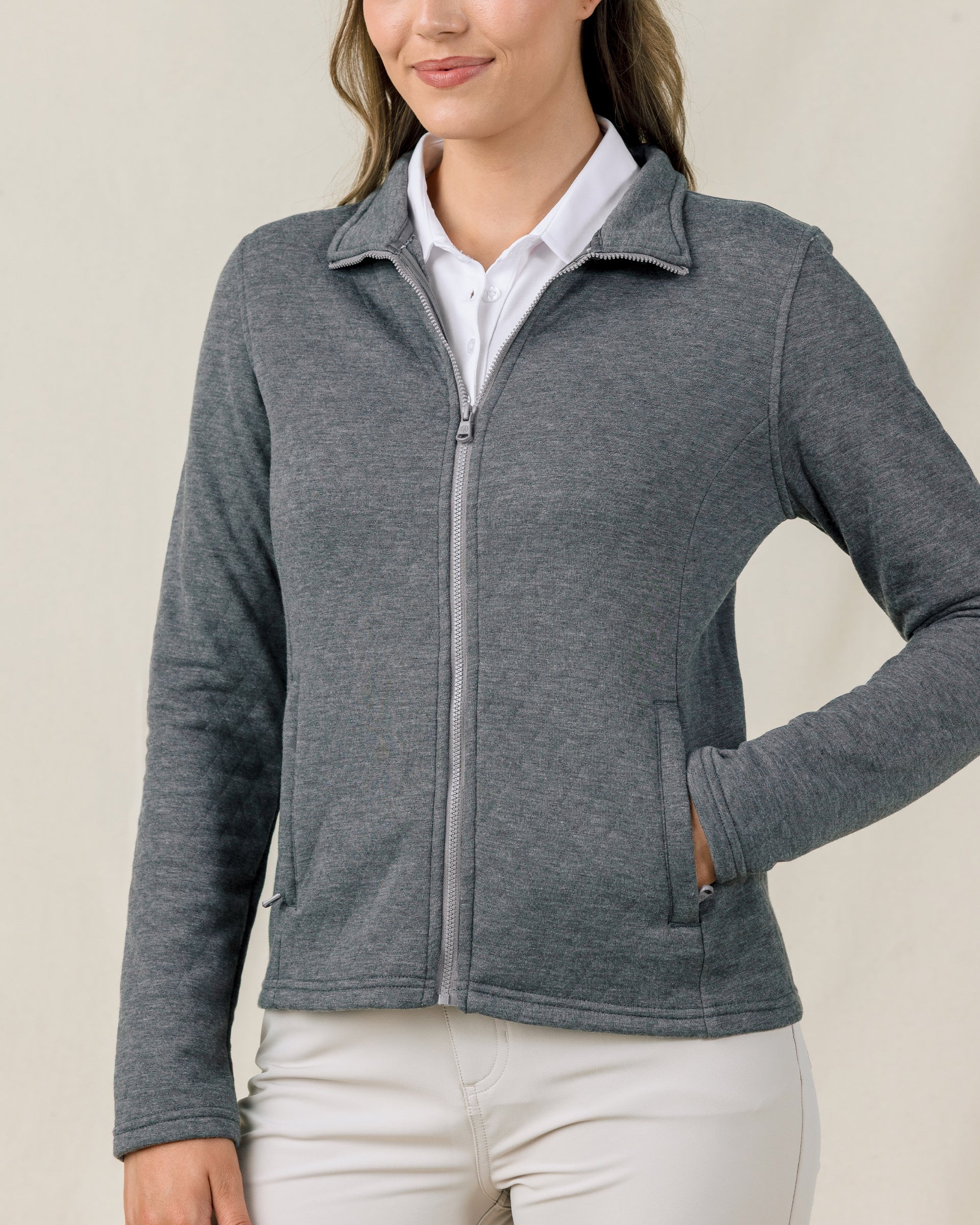 Close front view of a model wearing the Marlow Jacket in Nightshade, highlighting the full-zip design, stand collar, and front pockets.