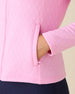 Marlow Jacket in Pink Floyd, close-up detail view on model featuring diamond quilt texture and side zip pocket