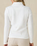 Women's Marlow Jacket in White, back view on model showcasing the diamond quilted texture pattern and fitted silhouette, styled with khaki pants