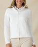 Women's Marlow Jacket in White, front view on model featuring a full-zip closure and diamond quilted texture pattern, styled with a white collared shirt and khaki pants