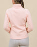 Back view of a model wearing the New Swing Jacket in Melba, highlighting the textured fabric, contrast side panels, and fitted silhouette.