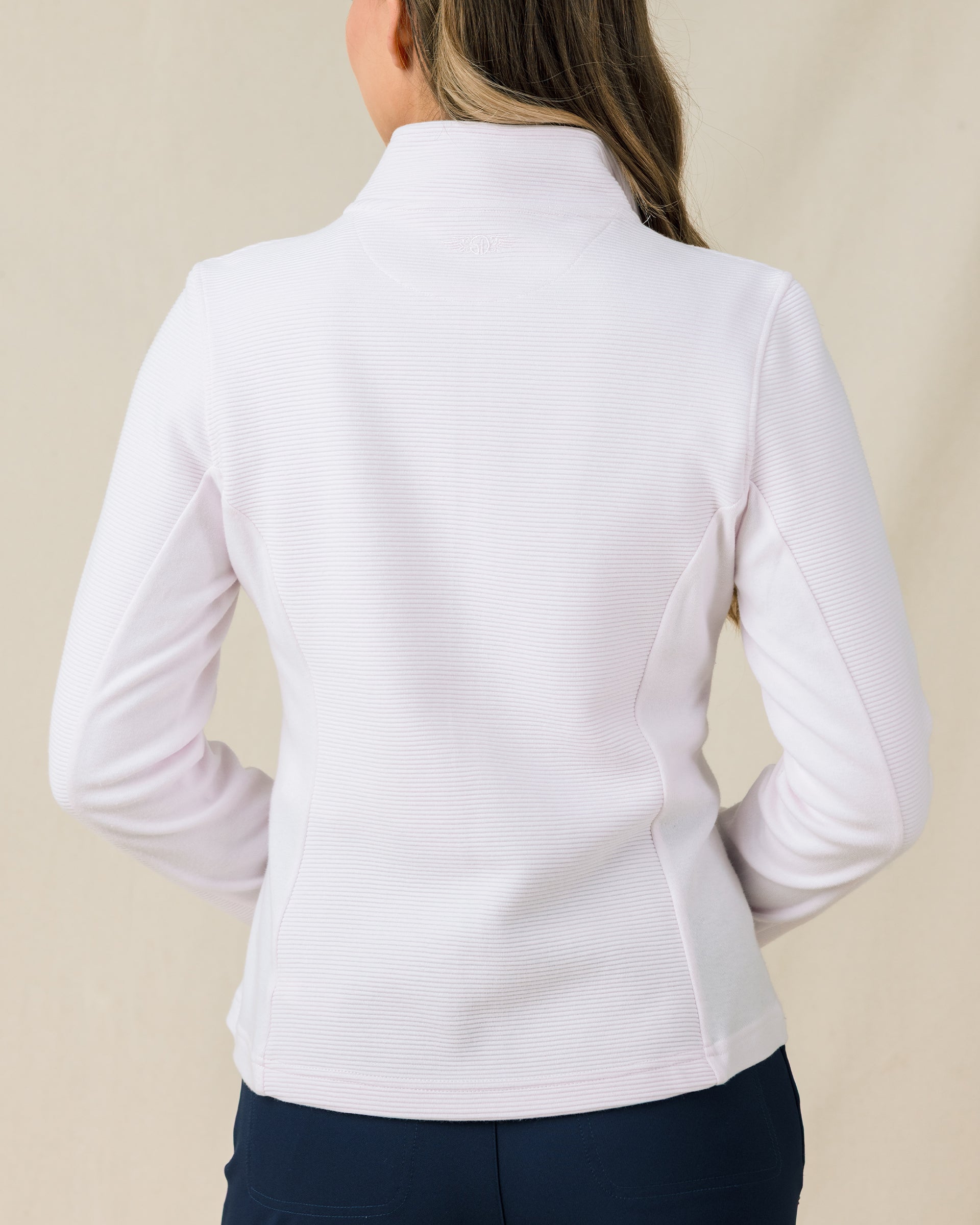 Back view of the Straight Down New Swing Jacket in Pale Pink showcasing the ribbed texture