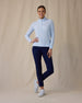 Women's Hills Quarter Zip in Lake, full length front view on model featuring a light blue waffle-knit quarter-zip pullover with mock neck collar and silver zipper hardware, paired with navy pants and white golf shoes