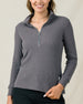 Woman wearing the Hills Quarter Zip in Nightshade, showcasing the textured waffle knit fabric and quarter-zip collar.