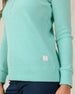 Close-up of the Hills Quarter Zip in Cascade showing soft waffle texture and side logo detail