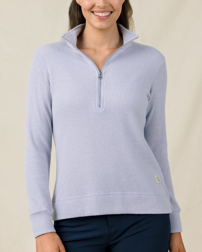 Woman wearing the Straight Down Hills Quarter Zip in Cosmic Blue, front view