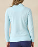 Hills Quarter Zip in Gemstone, back view on model featuring a light aqua waffle knit quarter zip pullover, paired with navy pants