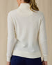 Women's Hills Quarter Zip in Cream, back view on model featuring a cream long sleeve quarter zip pullover with a waffle knit texture, paired with navy pants