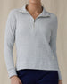 Women's Hills Quarter Zip in New Heather, front close-up view featuring a light heather gray waffle-knit quarter zip pullover with a silver zipper, spread collar, and Straight Down logo patch at the hem