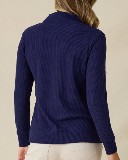 Women's Hills Quarter Zip in New Indigo, back view on model showcasing a navy waffle knit texture, styled with khaki pants