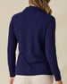 Women's Hills Quarter Zip in New Indigo, back view on model showcasing a navy waffle knit texture, styled with khaki pants