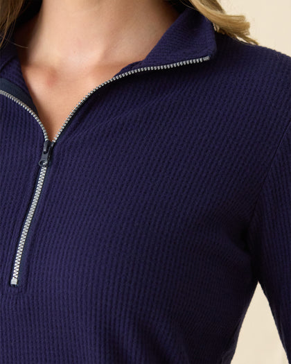 Women's Hills Quarter Zip in New Indigo, close-up detail view of the navy quarter-zip closure and collar with waffle knit texture