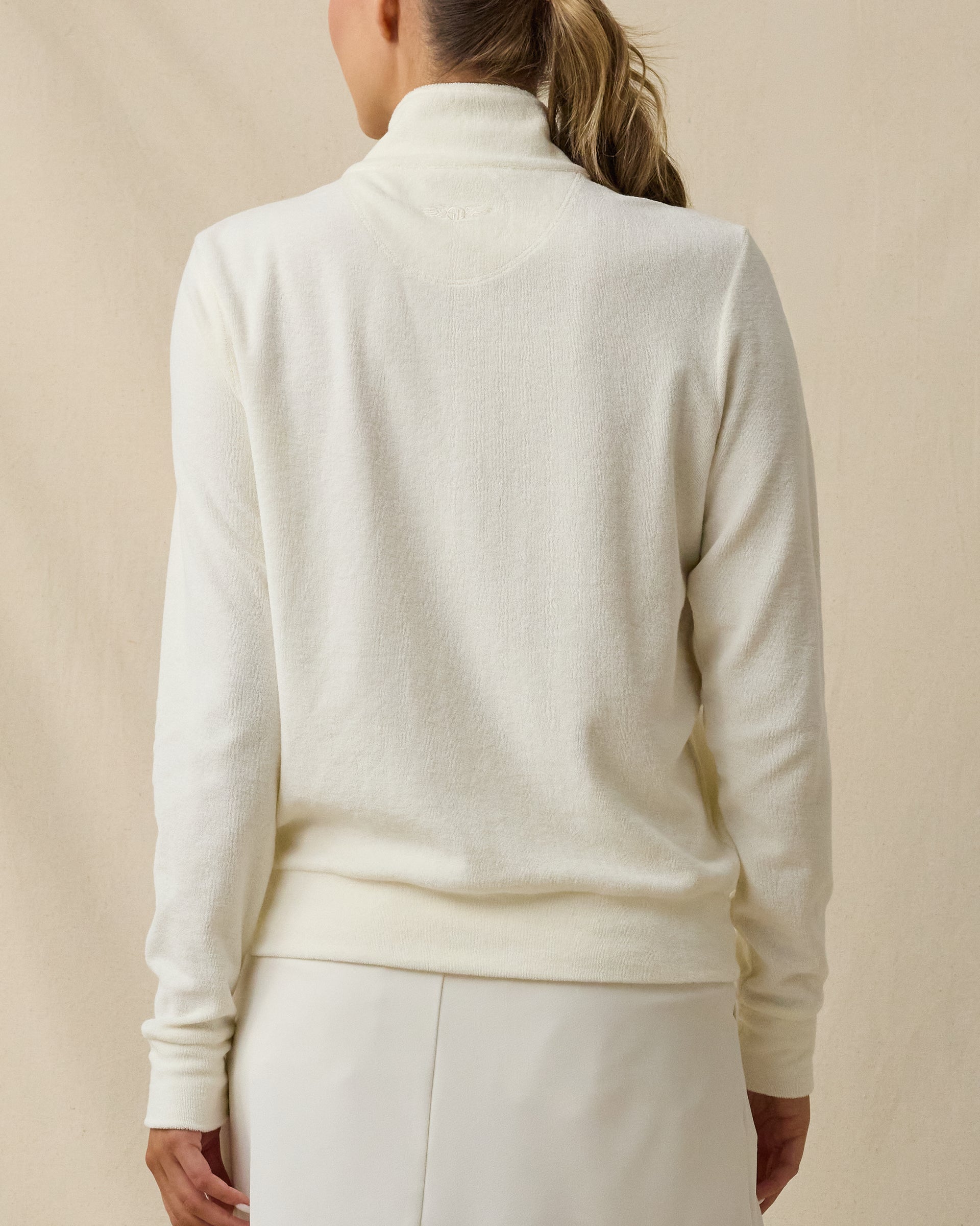 Back view of the Straight Down Collette Quarter Zip in Coconut featuring soft terry cloth fabric