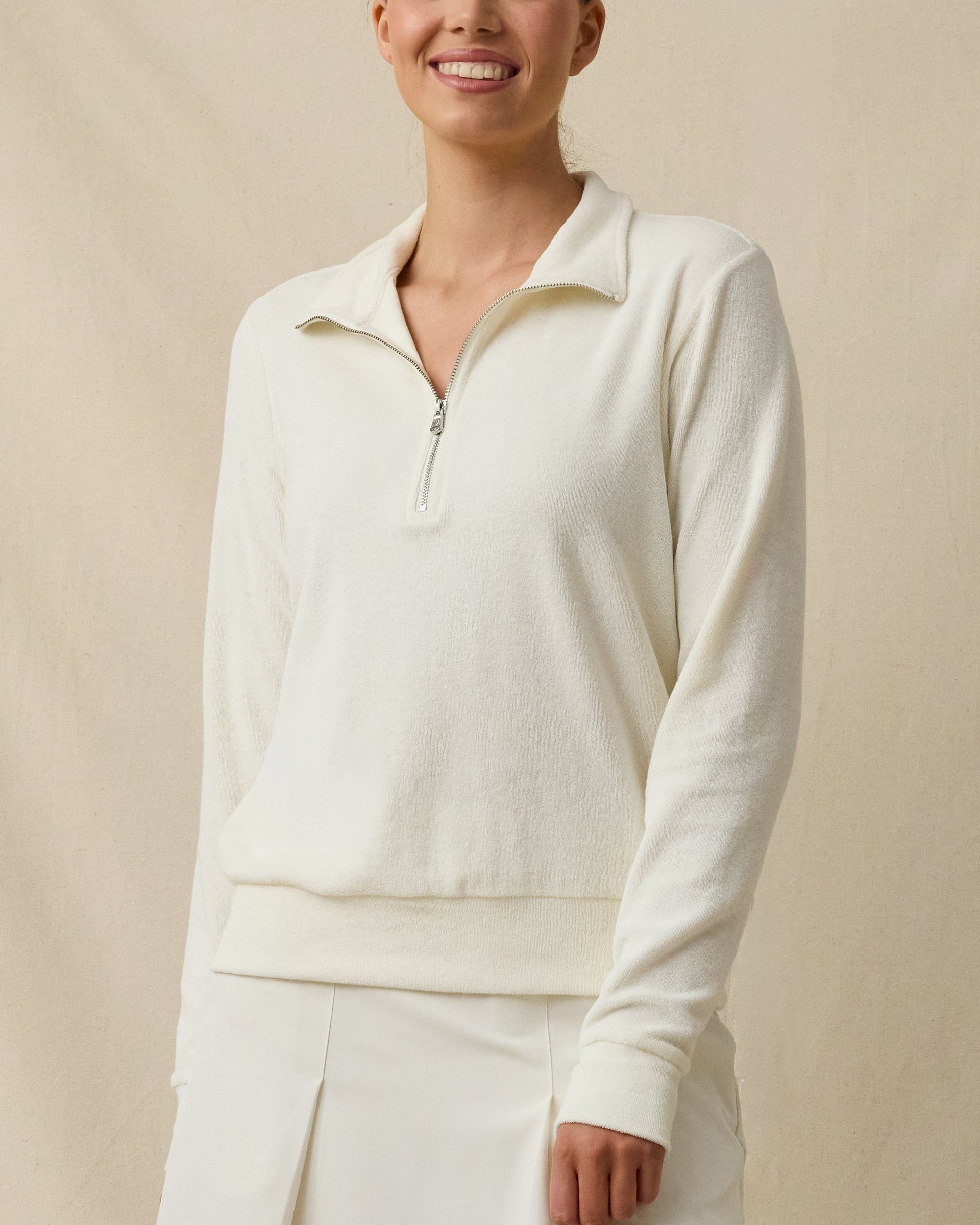 Woman wearing the Straight Down Collette Quarter Zip in Coconut, front view