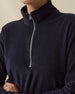 Collette Quarter Zip in New Indigo, zipped collar detail showcasing the plush brushed fabric and quarter-zip closure