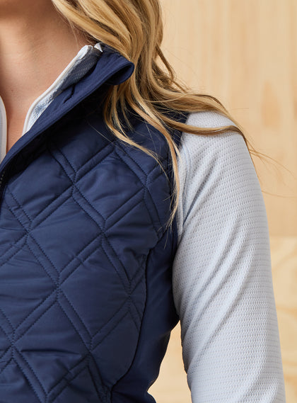 Women's Hestia Vest in New Indigo, close-up detail view of the navy quilted diamond pattern