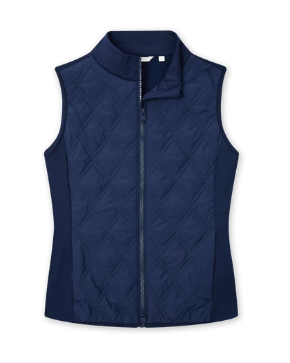 Women's Hestia Vest in New Indigo, flat lay front view featuring a hybrid construction with a quilted diamond-pattern front body and solid stretch side panels, full zip closure, and stand-up collar