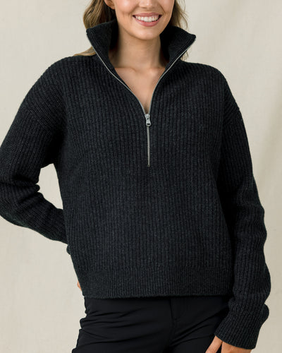 Woman wearing the Devon Half Zip Sweater in Charcoal, showing the relaxed fit, ribbed texture, and high zip collar.