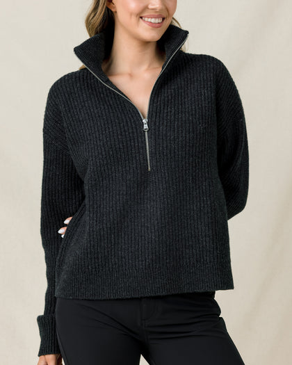 Woman wearing the Devon Half Zip Sweater in Charcoal, highlighting the relaxed fit, textured knit, and half-zip neckline.