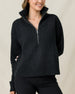Woman wearing the Devon Half Zip Sweater in Charcoal, highlighting the relaxed fit, textured knit, and half-zip neckline.