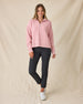 Women's Devon Half Zip Sweater in Rose, full-length front view on model featuring a pink quarter-zip closure and ribbed knit texture, styled with black pants and white shoes