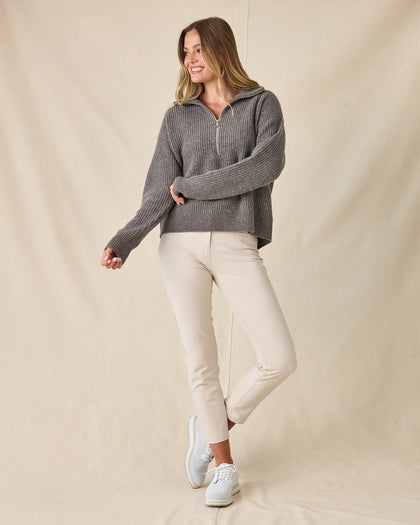 Women's Devon Half Zip Sweater in Woodland, full-length front view on model featuring a grey quarter-zip closure and ribbed knit texture, styled with khaki pants and white shoes