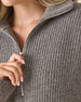 Women's Devon Half Zip Sweater in Woodland, close-up detail view of the grey quarter-zip closure and collar with ribbed knit texture